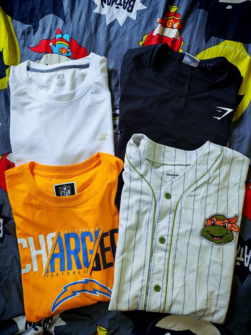 Branded drifit (Category: Activewear) located in Mandaluyong City. Submitted by fiercestorm.31 (Listing ID 1461825579, Image 1). Description: Bundle Drifit shirts Gymshark, Starter, NFL LA Chargers - Large TMNT (ninja turtles) jersey - small to med ₱2000 only!!! Rush sale!!! Dm for nego.