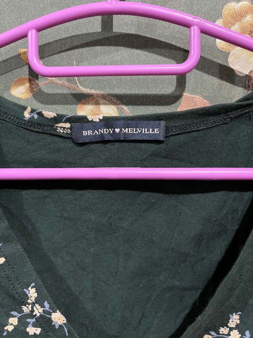 Brandy Melville — Floral Wrap Top (Category: Blouses) located in Sindangan. Submitted by waterbop (Listing ID 1461919674, Image 2). Description: Brandy Melville — Floral Wrap Top 850 + SF EXCELLENT CONDITION NO ISSUE COLOR RATE 10/10 PIT TO PIT: 14" LENGTH: 14.5 " LOC ZAMBOANGA DEL NORTE.