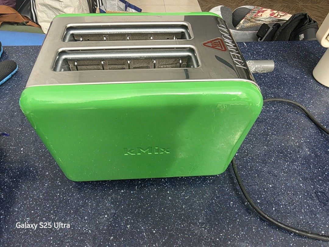 BREAD TOASTER (Category: Ovens & Toasters) located in Kuala Lumpur. Submitted by kben1981 (Listing ID 1461919819, Image 1). Description: FOR SALE: Kenwood kMix 2-Slice Toaster – Bright Green Classic Kenwood kMix toaster in that fun, vibrant green finish! Works perfectly — toasts evenly and heats up fast. ✅ Fully functional ✅ Stylish retro design ✅ 2 extra-wide slots ⚠️ Note: The control knob has some wear/defects as shown — still turns and works,