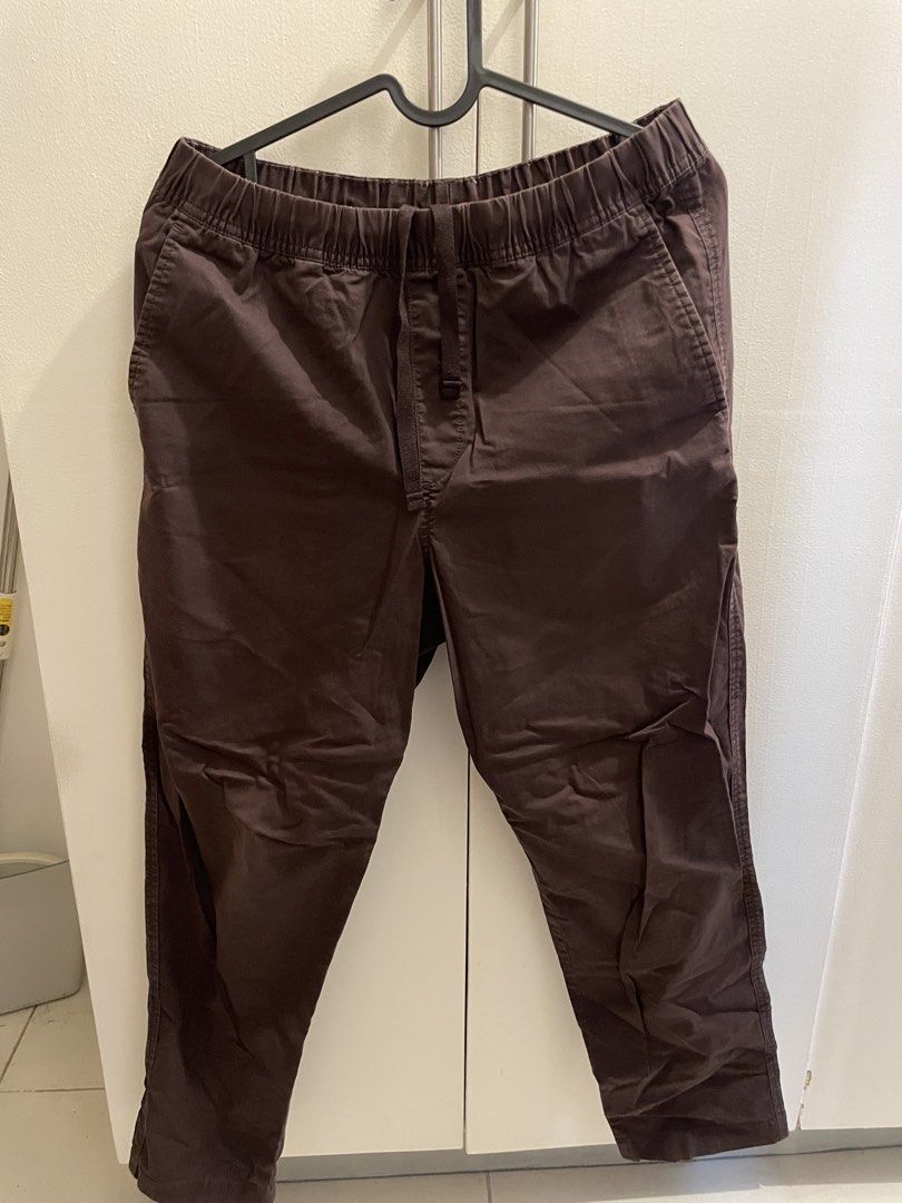 Uniqlo Brown Elastic Waist Pants with Drawstring (Category: Trousers) located in Manila. Submitted by jmmasangca50900 (Listing ID 1461973549, Image 1). Description: - Comfortable brown pants - Elastic waistband with drawstring for easy fit - Casual and simple style - Convenient side pockets - Ideal for everyday wear.