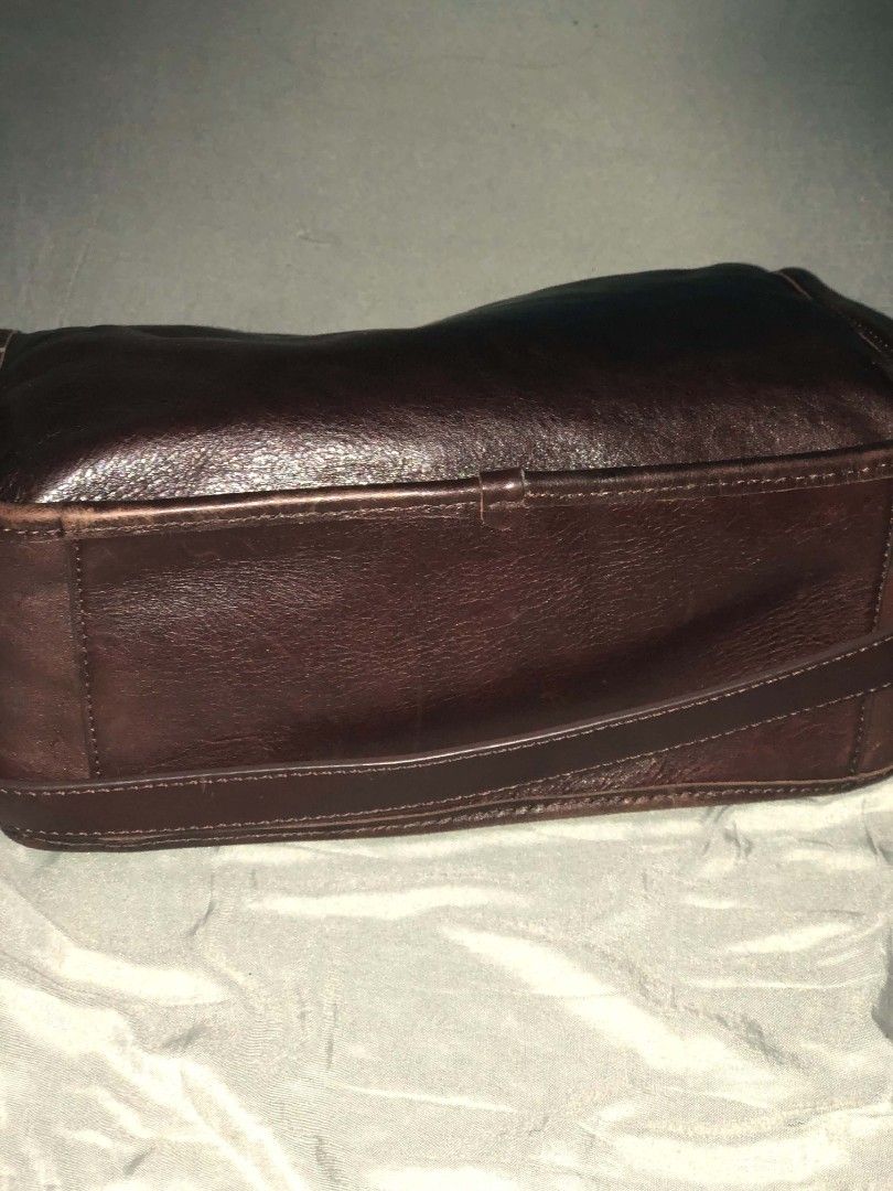 Brown Leather Shoulder Bag with Gold Hardware (Category: Shoulder Bags) located in Manila. Submitted by hollysansh (Listing ID 1461854939, Image 3). Description: - Classic brown leather shoulder bag -Genuine vintage leather - Secure zip closure - Elegant gold-tone hardware - Beautiful leather sheen - Lined interior - Adjustable strap for comfort - Ideal everyday bag.