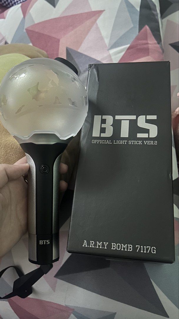 BTS light stick ARMYBOMB version 2 (Category: K-Wave Merchandise) located in Quezon City. Submitted by mswingks (Listing ID 1461820644, Image 1). Description: - unsealed, onhand - with box - still working - battery not included - RFS: decluttering and needs additional funds MOP: gcash.