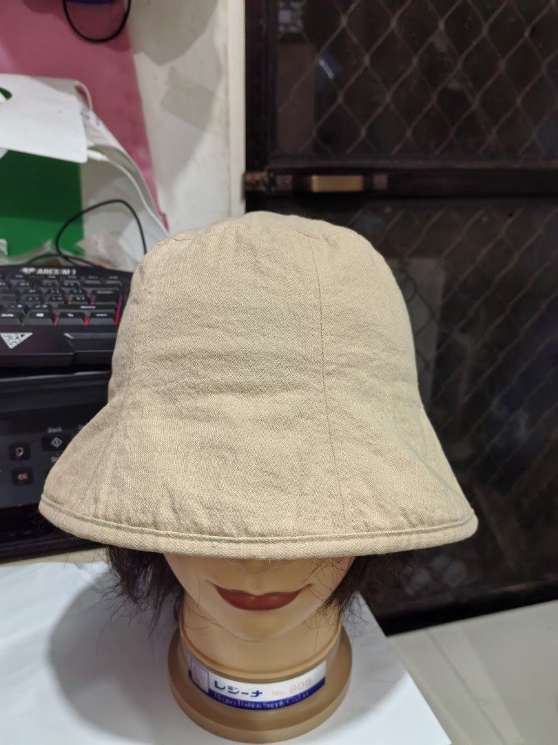 Bucket Hat (Category: Hats & Beanies) located in Cebu City. Submitted by dudes_villanueva (Listing ID 1461816884, Image 2). Description: Bucket Hat 📌 a classic, soft-structured beige bucket hat. It is made from a breathable woven fabric—typically cotton canvas or a linen blend—making it a perfect casual accessory for sun protection and everyday casual outfits 📌 The hat features a standard sloped downward brim, distinct panel stitching running f