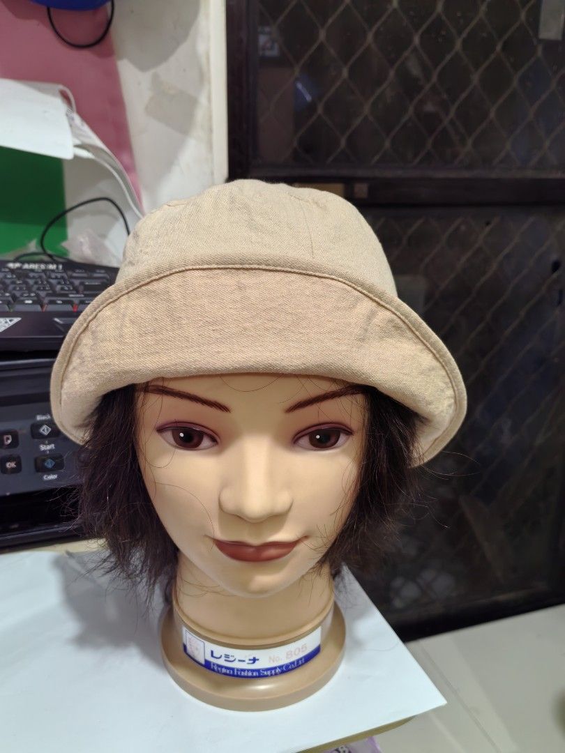 Bucket Hat (Category: Hats & Beanies) located in Cebu City. Submitted by dudes_villanueva (Listing ID 1461816884, Image 3). Description: Bucket Hat 📌 a classic, soft-structured beige bucket hat. It is made from a breathable woven fabric—typically cotton canvas or a linen blend—making it a perfect casual accessory for sun protection and everyday casual outfits 📌 The hat features a standard sloped downward brim, distinct panel stitching running f