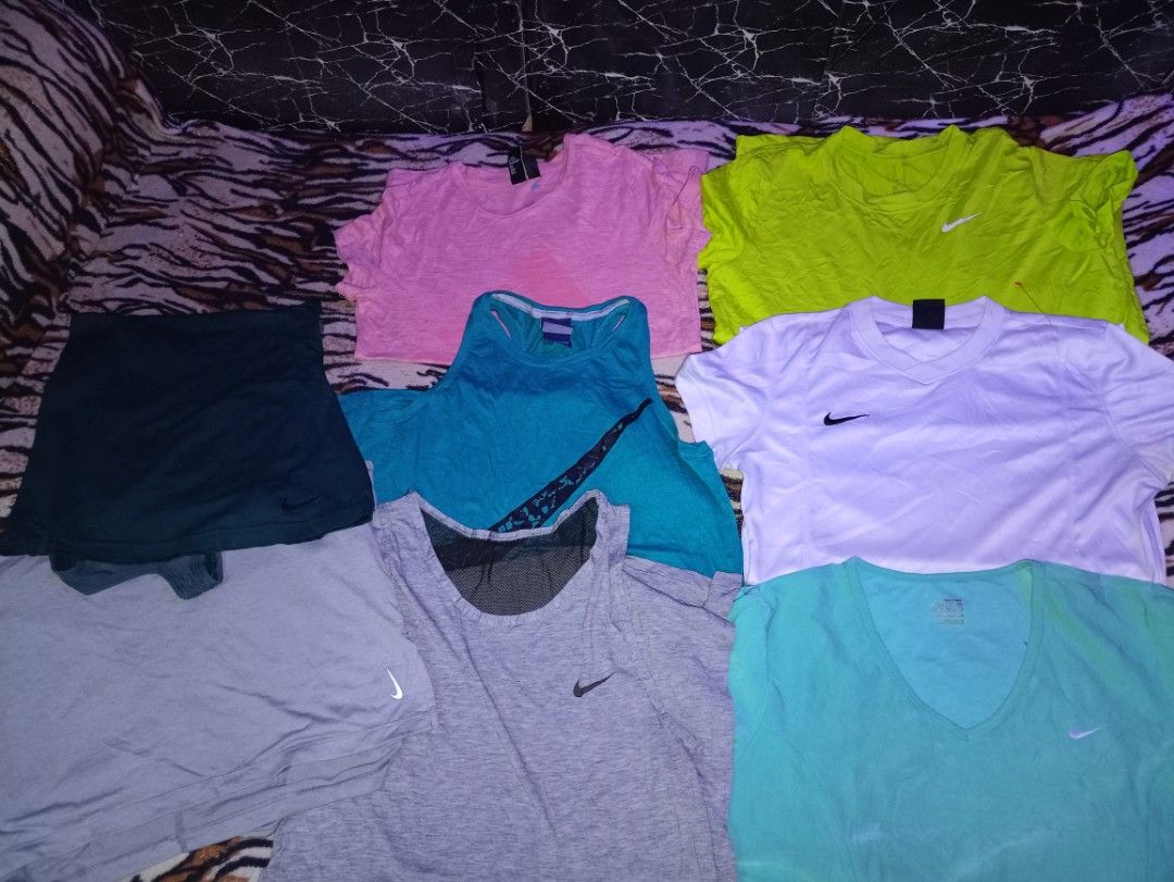 Bundle of 8 Nike Tops - Various Colors (Category: Others Tops) located in Manila. Submitted by naixhrift (Listing ID 1461848518, Image 2). Description: -Nike Bundle of 8 Nike tops For women for resell - Ideal for sports or casual wear - All are authentic Nike brand 1800 plus ship jnt courier payment on gcash for trusted only.