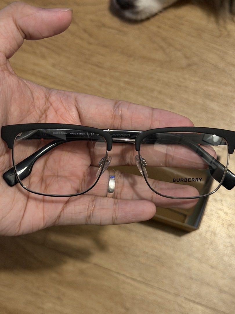 Burberry Eyeglasses with Case (Category: Sunglasses & Eyewear) located in Manila. Submitted by jncrls.bnt (Listing ID 1461896429, Image 1). Description: - Authentic Burberry glasses - Black and silver frame - Comes with original Burberry case and box - Made in Italy - Ideal for everyday wear - Selling as is Burberry Eyeglass Never worn Wala pa grado Originally Bought sa Saudi RFS - Not my style.