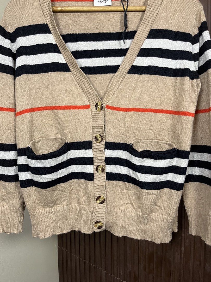 Burberry Wool V-Neck Striped Cardigan (Category: Coats, Jackets and Outerwear) located in Cabanatuan. Submitted by cabsygoods (Listing ID 1461912464, Image 3). Description: Burberry Wool V-Neck Striped Cardigan Width 19 Length 24 Very good condition Issue cut washtag Color rate 9/10 Dm to purchase! 📩.