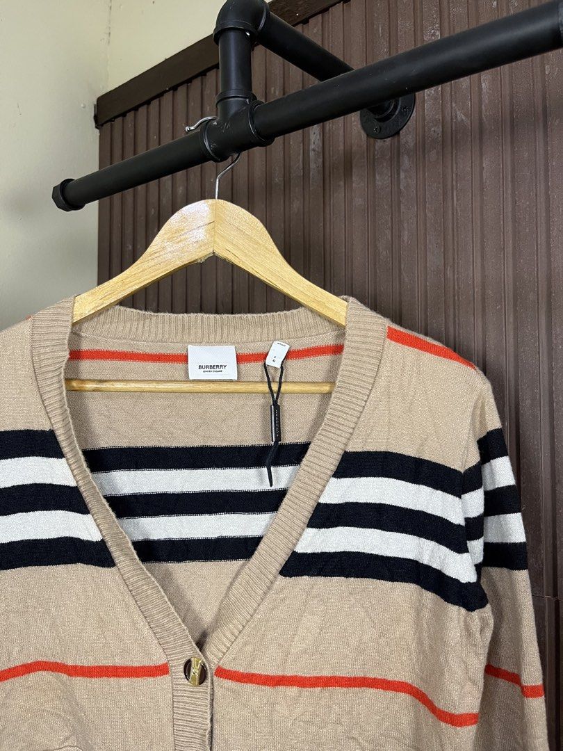 Burberry Wool V-Neck Striped Cardigan (Category: Coats, Jackets and Outerwear) located in Cabanatuan. Submitted by cabsygoods (Listing ID 1461912464, Image 2). Description: Burberry Wool V-Neck Striped Cardigan Width 19 Length 24 Very good condition Issue cut washtag Color rate 9/10 Dm to purchase! 📩.