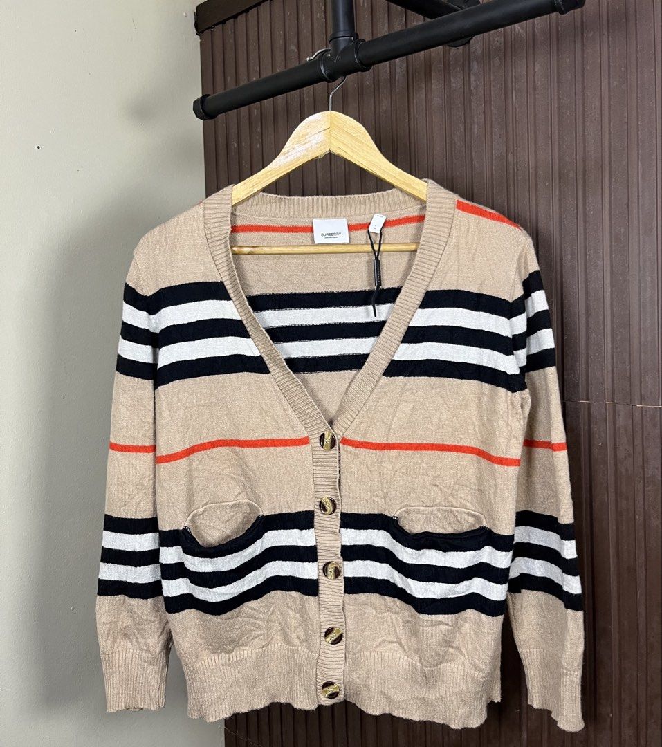 Burberry Wool V-Neck Striped Cardigan (Category: Coats, Jackets and Outerwear) located in Cabanatuan. Submitted by cabsygoods (Listing ID 1461912464, Image 1). Description: Burberry Wool V-Neck Striped Cardigan Width 19 Length 24 Very good condition Issue cut washtag Color rate 9/10 Dm to purchase! 📩.