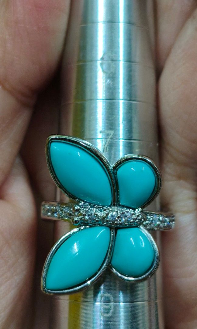 Butterfly Turquoise and Diamond Ring Size 9 (Category: Rings) located in Quezon City. Submitted by gemaicloset (Listing ID 1460451802, Image 2). Description: - Stunning butterfly design - Features vibrant turquoise stones - Accented with small diamonds - Crafted in sterling silver - Adds a pop of color to any outfit - Versatile for everyday wear or special occasions - A beautiful addition to any jewelry collection.