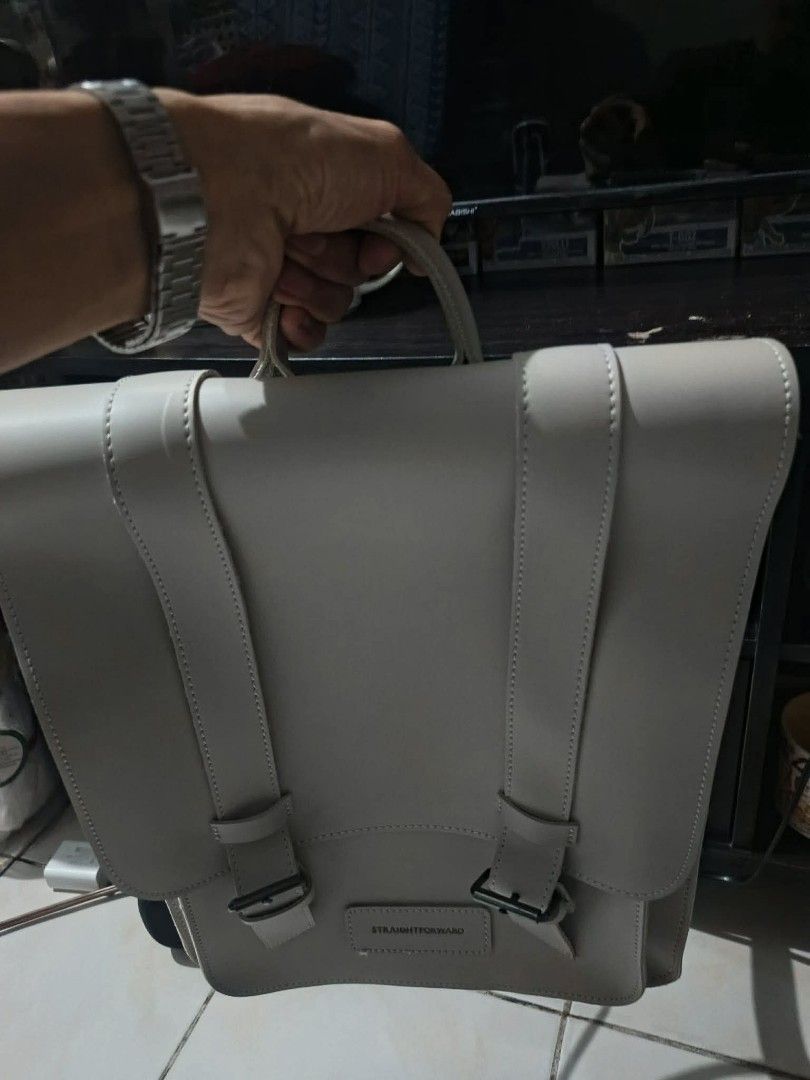 buy1take1 Straightforward Daily Vegan Leather Backpack - Light Grey (Category: Backpacks) located in Manila. Submitted by iamalex22 (Listing ID 1461917873, Image 1). Description: - Straightforward backpack in light grey. - Made from durable, stain-repellent, and water-resistant daily vegan leather. - Features front buckle straps. - Includes a top handle. - Ideal for everyday use. - Please check photos for more details. BLACK AT GRAY PO ITO DALAWA