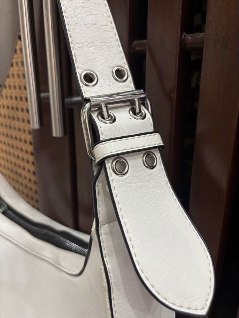 Call It Spring White Shoulder Bag (Category: Shoulder Bags) located in Trece Martires City. Submitted by decluttercloset_niks (Listing ID 1461910241, Image 2). Description: - zipper works properly 📍 Trece Martires, Cavite 💸 MOP: GCash / Metrobank 🛵 MOD: Lalamove • Pay first — buyer shoulders the delivery fee • For clothes, I do next-day delivery so I can properly prepare your order before sending it out..