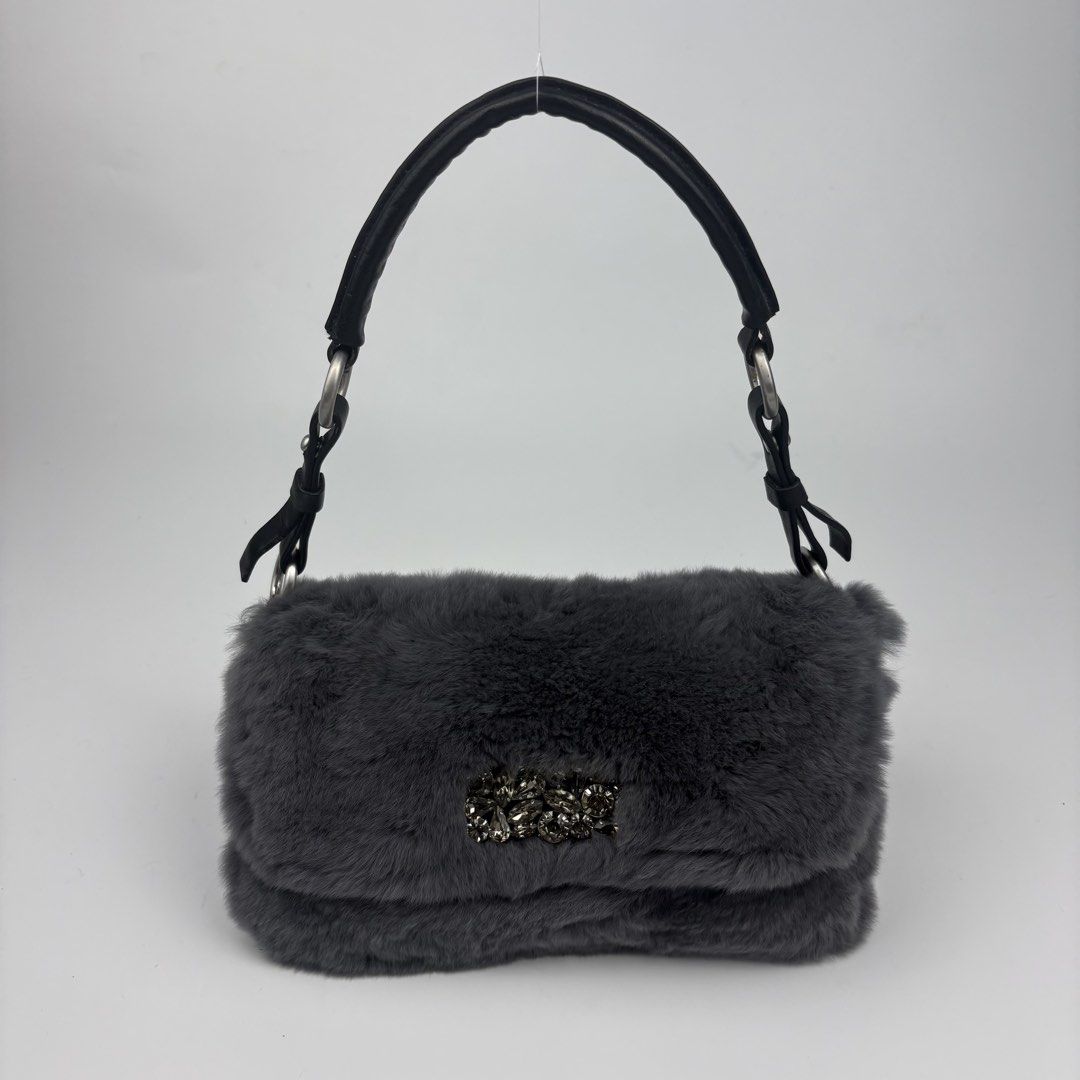 Calvin Klein Rabbit Fur Baguette Bag (Category: Luxury Bags & Wallets) located in Bacolod City. Submitted by cast.archives (Listing ID 1461804153, Image 1). Description: Calvin Klein Rabbit Fur Baguette Bag Size: Small Condition: Excellent Flaw: none.