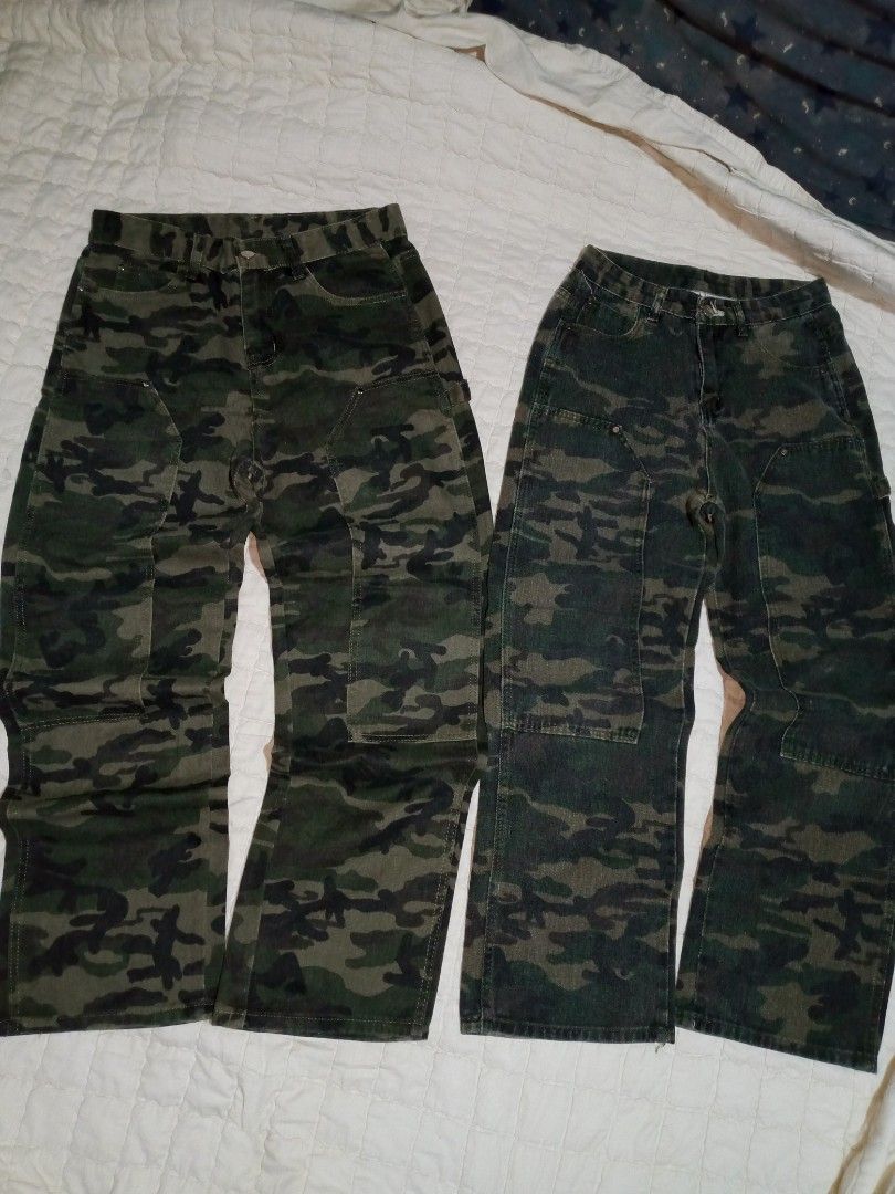 Camo Cargo Pants (Category: Jeans) located in Allen. Submitted by milyonaryung_gipit (Listing ID 1461853688, Image 1). Description: - Two pairs of camouflage cargo pants - Durable denim fabric - Relaxed fit - Multiple pockets for convenience 28 in 32 size - Ideal for casual streetwear and everyday wear - Adds a cool vibe to your wardrobe.