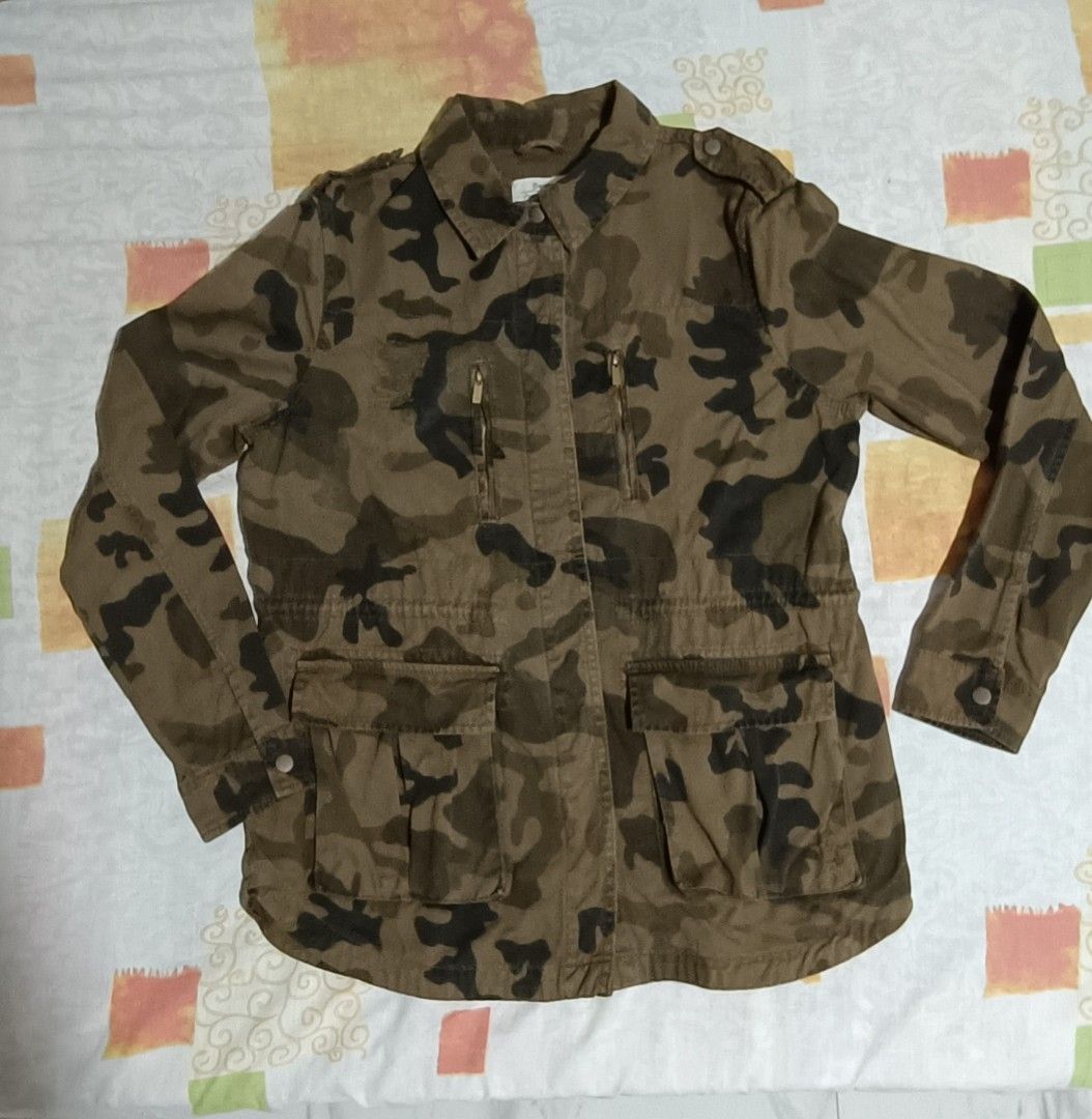 Camouflage Utility Jacket with Pockets (Category: Coats, Jackets and Outerwear) located in Imus. Submitted by snapandsketch (Listing ID 1461821891, Image 2). Description: - Used only for about 30 minutes in an event presentation. - Stylish camouflage utility jacket - Small rips at the upper portion at rhe front & back and at the lower left portion at the front are part of the design - Multiple functional pockets on the front - Secure zipper and b
