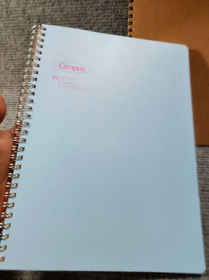 Campus B5 Notebooks (2 pcs) (Category: Stationery & School Supplies) located in San Leonardo. Submitted by burgossanleonardo.12345 (Listing ID 1461818564, Image 3). Description: - Set of 2 Campus notebooks - 1 Light Blue notebook: B5 size, 70 sheets, 7mm ruled with 31 lines - 1 Brown Kraft Cover notebook - Both notebooks are spiral bound - Ideal for school notes, work notes, journaling, and more!.