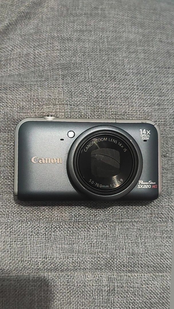 Canon PowerShot SX220 HS 14x Optical Zoom Digital Camera (Category: Cameras) located in Manila. Submitted by chiio_o (Listing ID 1461946372, Image 1). Description: CANON POWERSHOT SX220 HS NEGOTIABLE FOR SURE BUYER All buttons functioning well In good working condition Overall body is in good condition (9/10) Specs: • 12.1 MP CMOS Sensor • 28–392mm equivalent lens • 14x Optical Zoom • Full HD 1080p Video Recording • Optical Image Stabilization • 