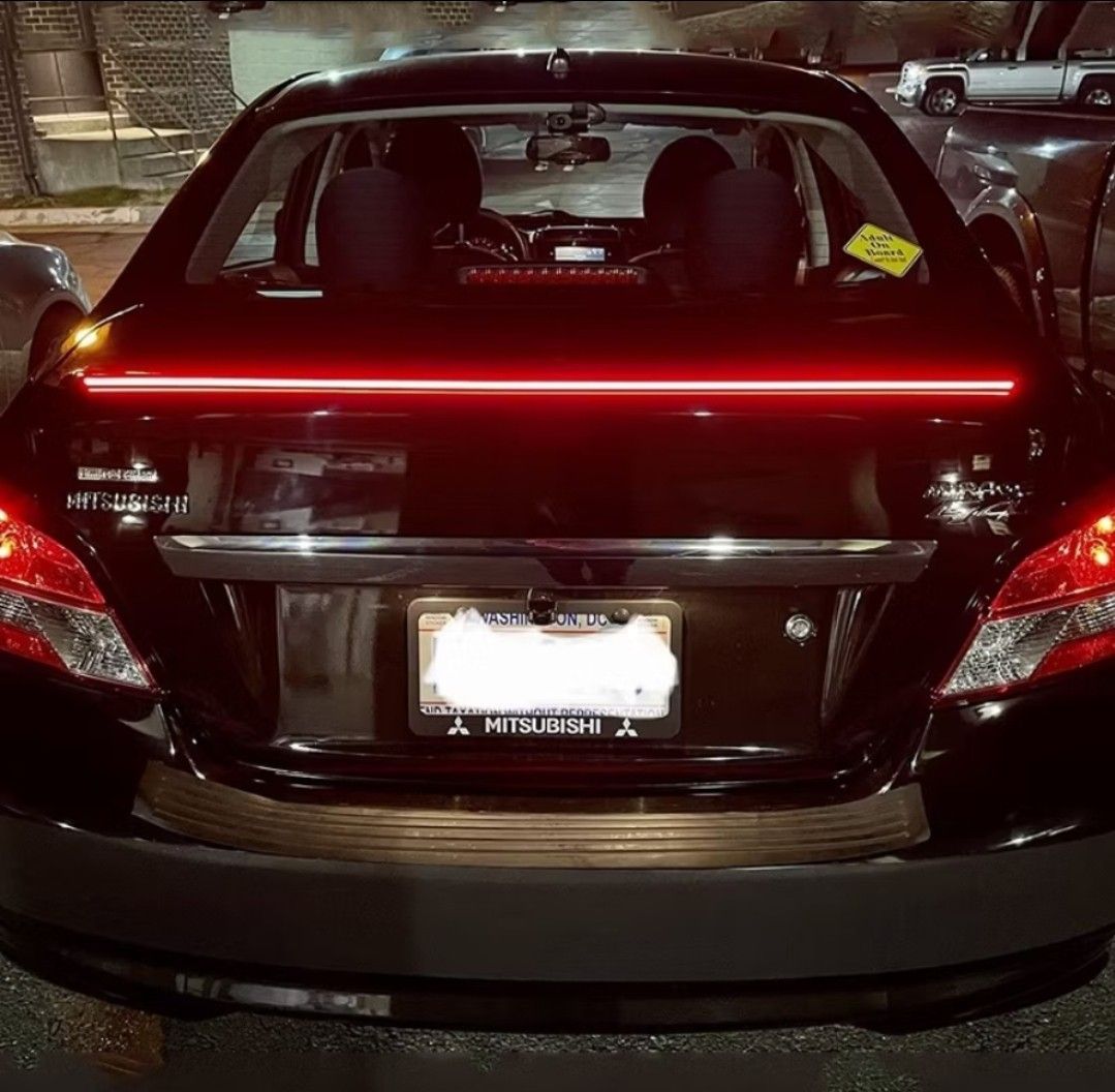 CARBON LED SPOILER REAR LIP KIT (Category: Lightings, Horns, and other Electrical Parts and Accessories) located in San Mateo. Submitted by reyshel08 (Listing ID 1461844548, Image 1). Description: - Carbon fiber look rear lip spoiler with integrated LED light strip - Universal fit for most car models - Enhances sporty and modern aesthetics - Provides a unique visual accent, especially at night - Easy to install.