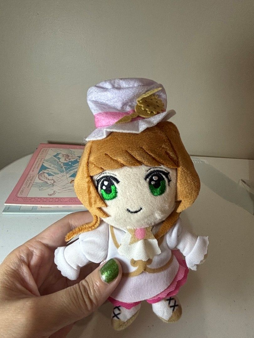 Cardcaptor Sakura Clamp Plushie (Category: Plushies & Soft Toys) located in Pasig City. Submitted by ccsakura4 (Listing ID 1461929989, Image 1). Description: - Adorable Clamp Sakura Kinomoto plush toy from Cardcaptor Sakura. - Ideal for display or gifting to anime fans. - Approximately 6 inches tall. - Includes original tag..