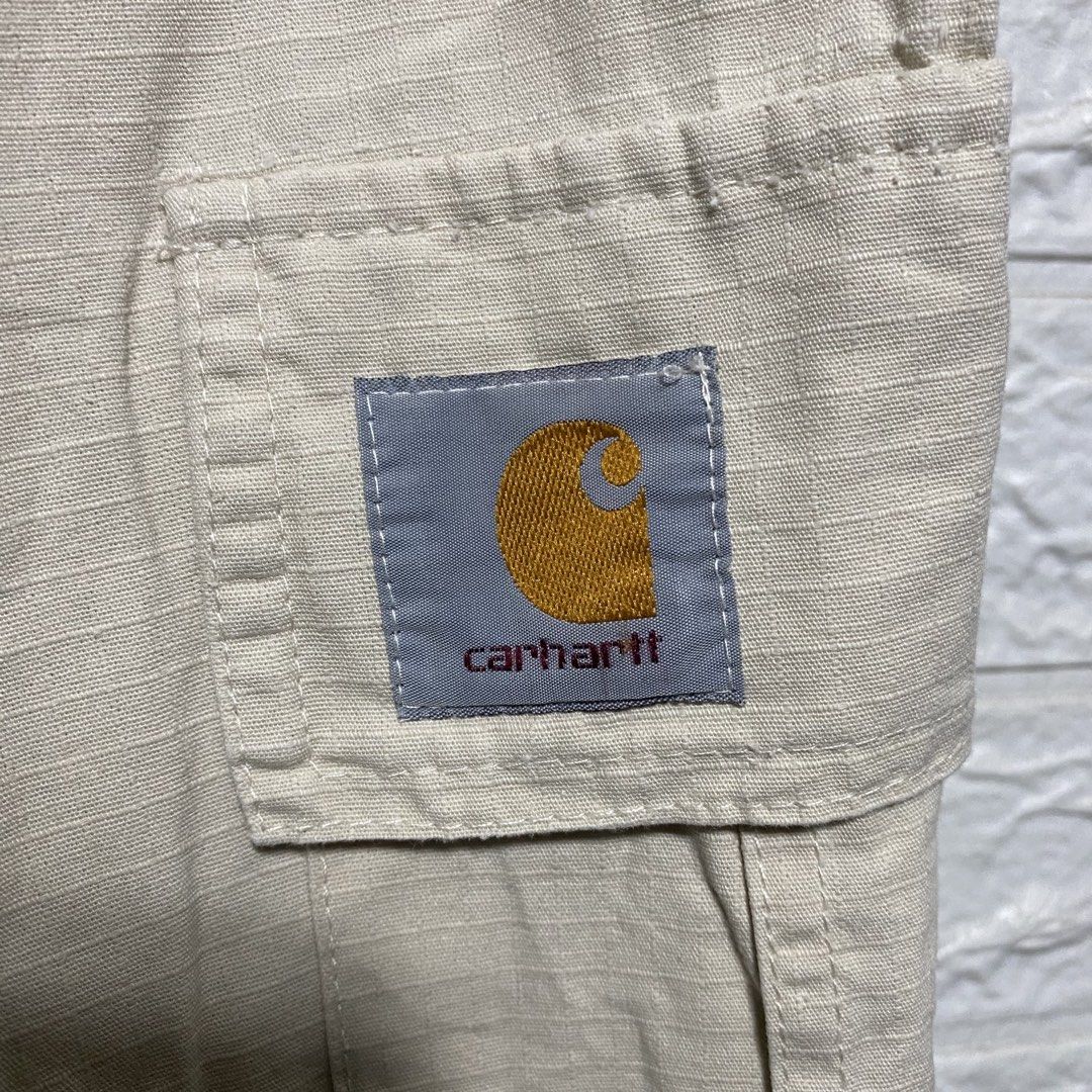 Carhartt Cargo Pants Beige Men's Size [Size] (Category: Jeans) located in Naga. Submitted by thesource4400 (Listing ID 1461953530, Image 3). Description: - Classic Carhartt cargo pants in neutral beige. - Durable material, built to last. - Multiple pockets for storage. - Button and zip fly closure. - Versatile for work or casual outfits..