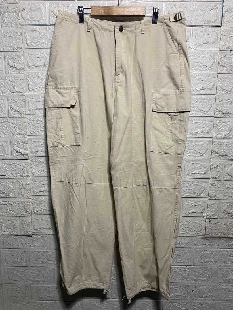 Carhartt Cargo Pants Beige Men's Size [Size] (Category: Jeans) located in Naga. Submitted by thesource4400 (Listing ID 1461953530, Image 1). Description: - Classic Carhartt cargo pants in neutral beige. - Durable material, built to last. - Multiple pockets for storage. - Button and zip fly closure. - Versatile for work or casual outfits..