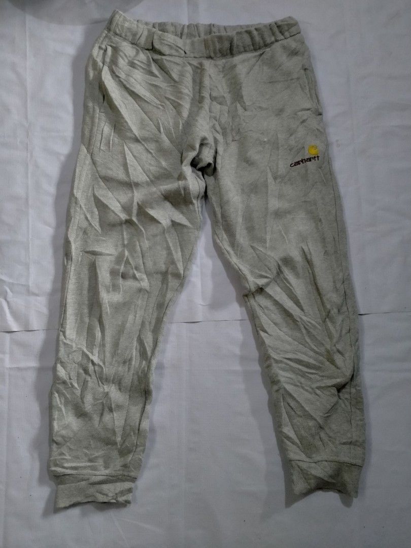 Carhartt Grey Sweatpants Joggers Size M (Category: Joggers) located in Davao. Submitted by ervinpolino09 (Listing ID 1461841006, Image 1). Description: - Grey Carhartt sweatpants - Jogger style - Elastic waistband with drawstring - Two side pockets - Embroidered Carhartt logo on left thigh - Made from a cotton blend - Size: Medium (M)30/34 Stretchable issue minimal scratch - Ideal for casual wear.