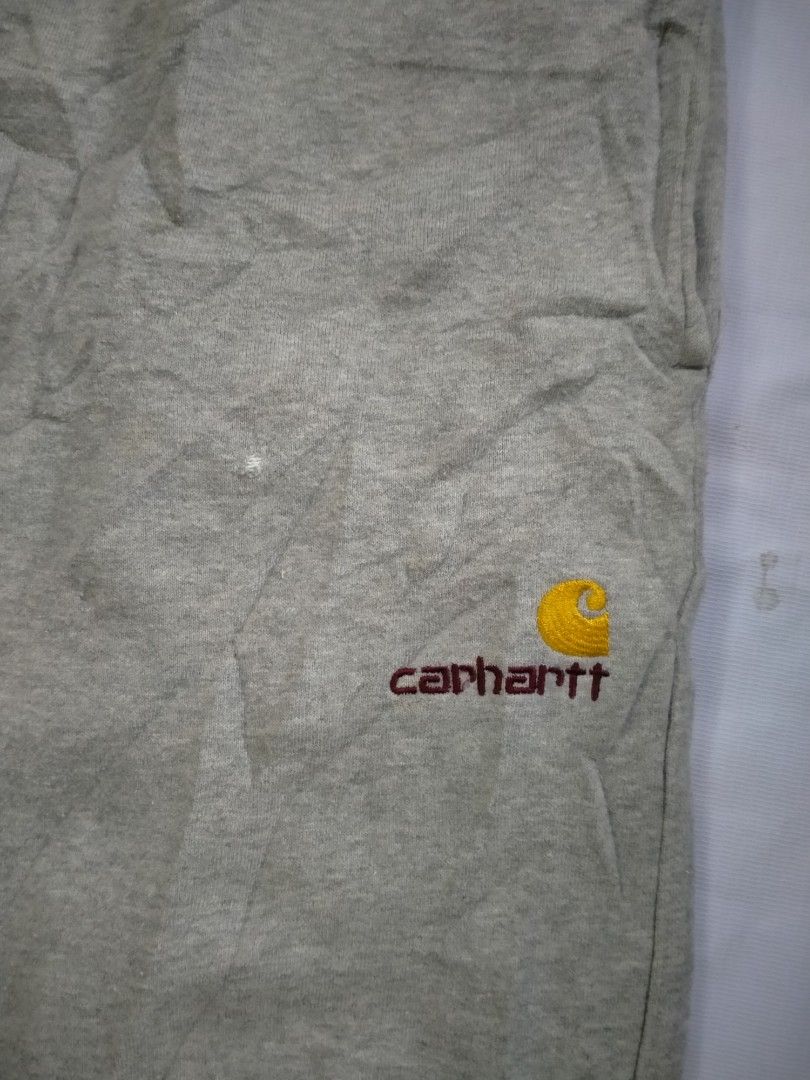 Carhartt Grey Sweatpants Joggers Size M (Category: Joggers) located in Davao. Submitted by ervinpolino09 (Listing ID 1461841006, Image 2). Description: - Grey Carhartt sweatpants - Jogger style - Elastic waistband with drawstring - Two side pockets - Embroidered Carhartt logo on left thigh - Made from a cotton blend - Size: Medium (M)30/34 Stretchable issue minimal scratch - Ideal for casual wear.