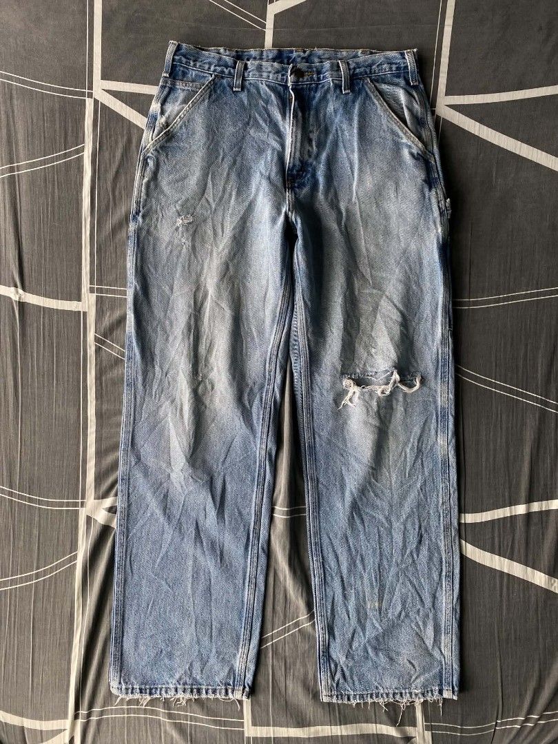 Carhartt Light Wash Denim Carpenter Jeans (Category: Jeans) located in Manila. Submitted by raymondrob54698 (Listing ID 1461851849, Image 3). Description: - Light wash Carhartt carpenter jeans - Classic workwear style - Multiple pockets and hammer loop - Distressed details on knees and hem - Relaxed fit - Great for everyday wear or workwear aesthetic.