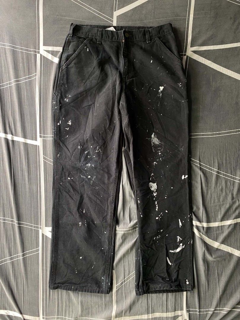 Carhartt WIP Work Pants Black Paint Splatter (Category: Jeans) located in Manila. Submitted by raymondrob54698 (Listing ID 1461852491, Image 3). Description: - Carhartt WIP work pants - Color: Black - Unique paint splatter detailing - Classic design - Size: 34x32 - Made in Mexico - Ideal for workwear or streetwear looks.