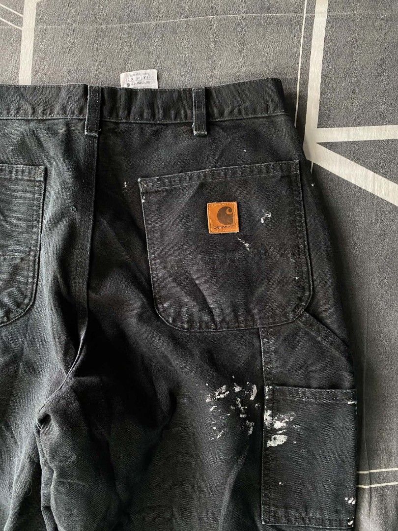 Carhartt WIP Work Pants Black Paint Splatter (Category: Jeans) located in Manila. Submitted by raymondrob54698 (Listing ID 1461852491, Image 2). Description: - Carhartt WIP work pants - Color: Black - Unique paint splatter detailing - Classic design - Size: 34x32 - Made in Mexico - Ideal for workwear or streetwear looks.