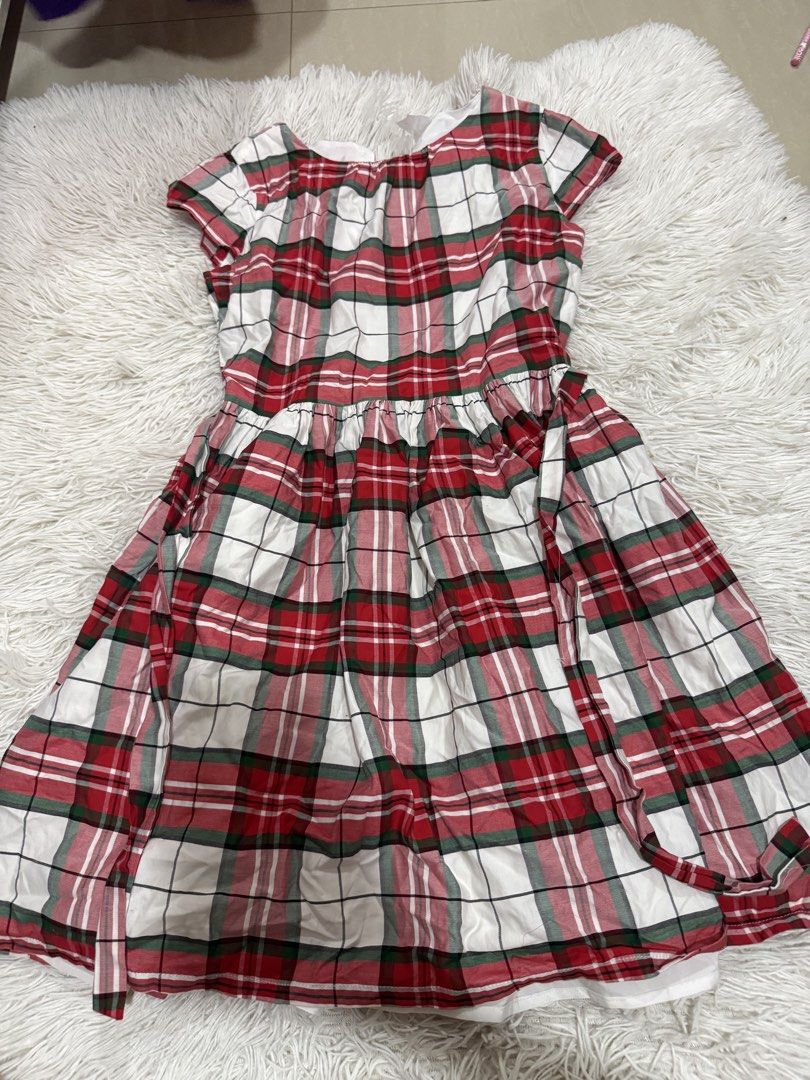 Carters Red Plaid Dress (Category: Babies & Kids Fashion) located in Las Pinas. Submitted by bellamommaaaa (Listing ID 1461952492, Image 1). Description: Cute red plaid dress, short sleeves, comfy elastic waist. Great for holidays or casual wear. Lightweight and breathable fabric. Size 12 on tag.