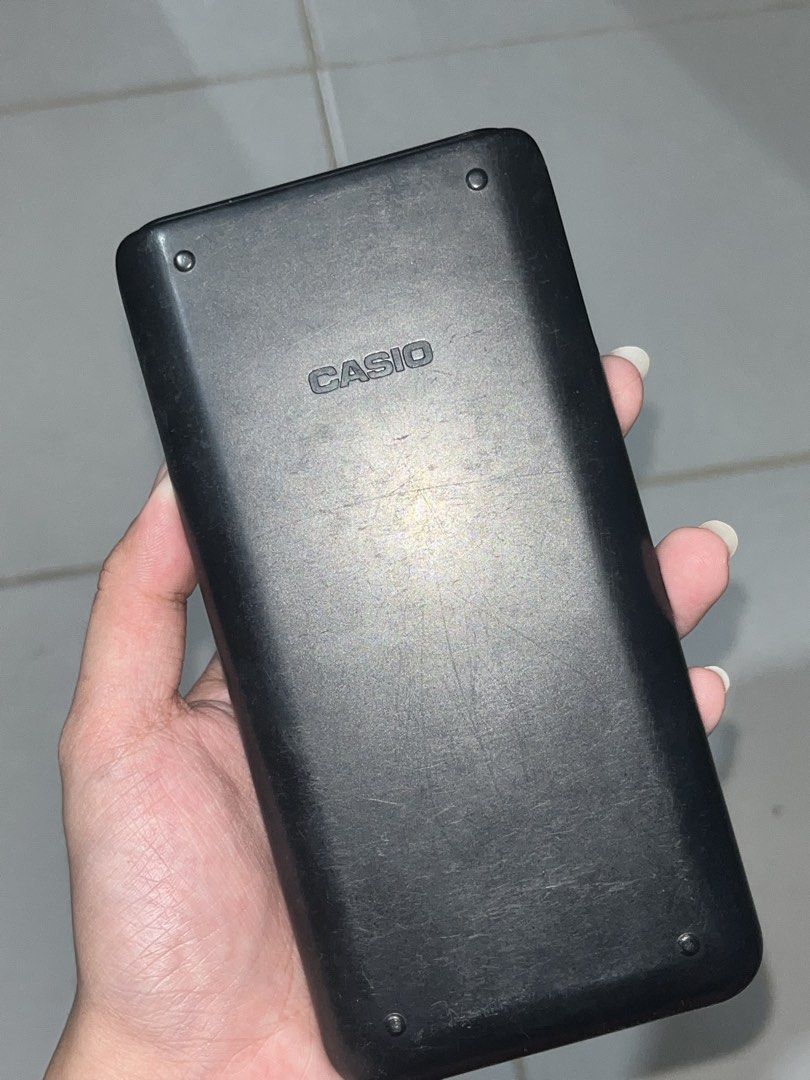 Casio fx-991 ES PLUS 2nd Edition (Category: Office & Business Technology) located in Batangas. Submitted by quick.jen____ (Listing ID 1461862836, Image 3). Description: WORKING CALCULATOR BUT HAS ISSUES‼️ Issue: need tapatan ng ilaw/flashlight yung solar sa taas para gumana but can be repaired pa naman. May mga scratches na din yung body. 📍Batangas City 💳Gcash 🚚 J&T.
