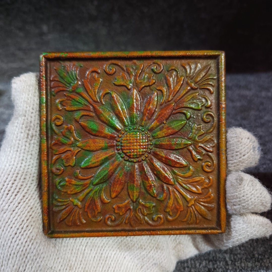 Cast Iron Tile Embossed Floral Pattern (Category: Wall Decor) located in Meycauayan. Submitted by ka_luma (Listing ID 1461972717, Image 2). Description: decorative faux-copper cast iron tile sample featuring an embossed floral pattern with a rustic green and orange patina finish. set of 2.