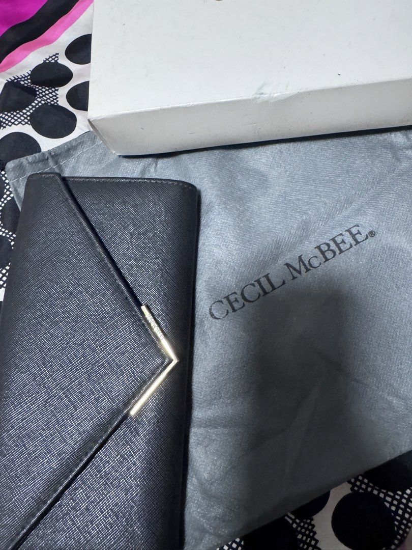 CECIL McBEE (Category: Luxury Bags & Wallets) located in Marikina City. Submitted by luvbags40524 (Listing ID 1461952810, Image 1). Description: Good condition 6 cards slot 4 compartments Coin purse Dm for interested .