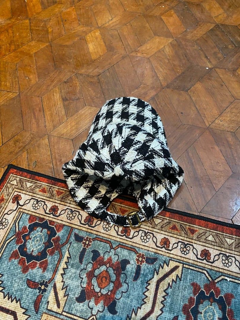 Celine Houndstooth Baseball Cap (Category: Caps & Hats) located in Pasig City. Submitted by paulclzdo (Listing ID 1461918937, Image 3). Description: - Stylish black and white houndstooth pattern - Features the iconic Celine logo on the front - Adjustable strap at the back for a customized fit - Perfect for adding a touch of classic flair to any casual outfit.