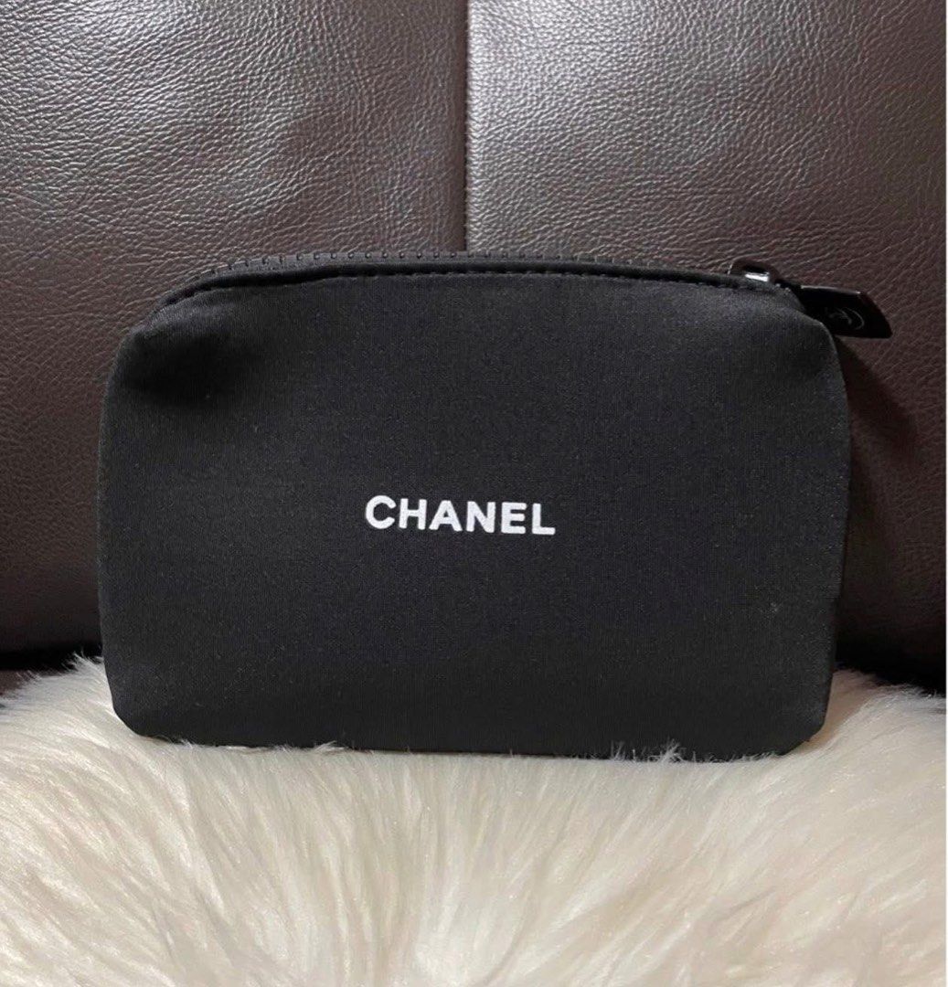 Chanel Black Cosmetic Pouch (Category: Luxury Bags & Wallets) located in Cebu City. Submitted by ludz_0246_2.0 (Listing ID 1461935902, Image 1). Description: - Authentic Chanel pouch - Zipper closure with branded charm - Ideal for makeup or small essentials - Made of durable material - Clean interior and exterior - Perfectly sized to fit inside your handbag.