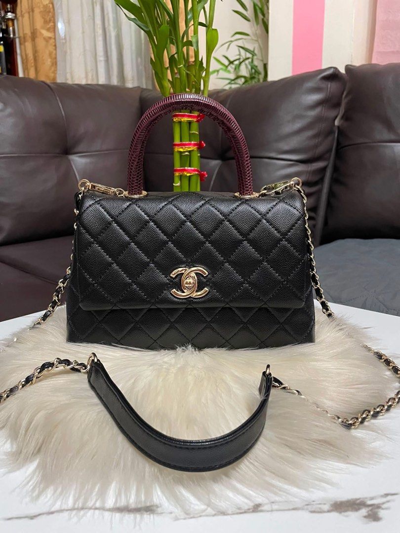 Chanel Classic Flap Bag Black Caviar Leather (Category: Luxury Bags & Wallets) located in Cebu City. Submitted by ludz_0246_2.0 (Listing ID 1461943852, Image 1). Description: - Classic Chanel flap bag - Black caviar leather with quilted pattern - Gold hardware and chain strap - Unique braided top handle - Convenient back pocket - Detachable shoulder strap included - Versatile for day or night use.