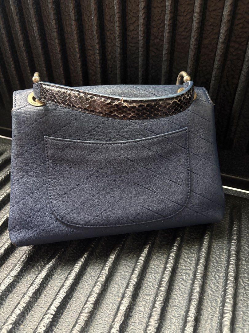 Chanel Coco Handle Small (Category: Purses & Pouches) located in Batangas. Submitted by strtdcltrs (Listing ID 1461945820, Image 2). Description: Chanel Coco Handle Small – Navy Blue Chevron Leather with Python Top Handle & Gold Hardware NGA Rear slip pocket, structured flap closure, single top handle, and chain strap attachment loops Off From Canal Street .