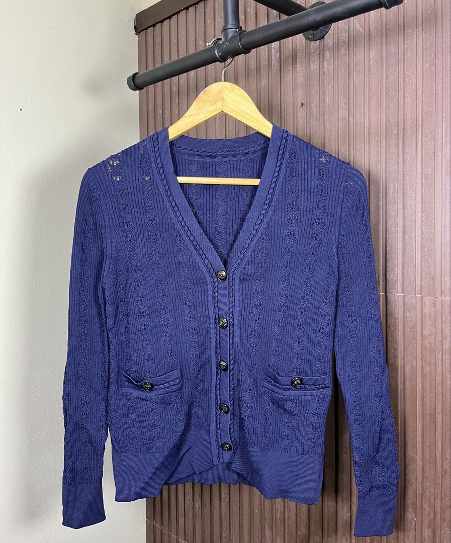 Chanel Knitted Cardigan (Category: Luxury Apparel) located in Cabanatuan. Submitted by cabsygoods (Listing ID 1461912075, Image 1). Description: Chanel Knitted Cardigan Width 17 Length 22 Very good condition Issue cut main tag Color rate 9/10 Dm to purchase! 📩.