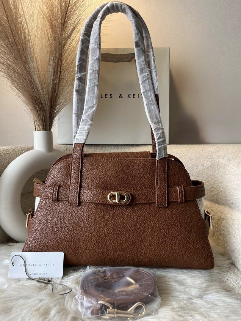 Charles & Keith Aubrielle Shoulder Bag - Brown (Category: Shoulder Bags) located in Pasig City. Submitted by preloved.closet2 (Listing ID 1461872973, Image 1). Description: Shoulder Bag Color chocolate brown Add paperbag plus 80 .