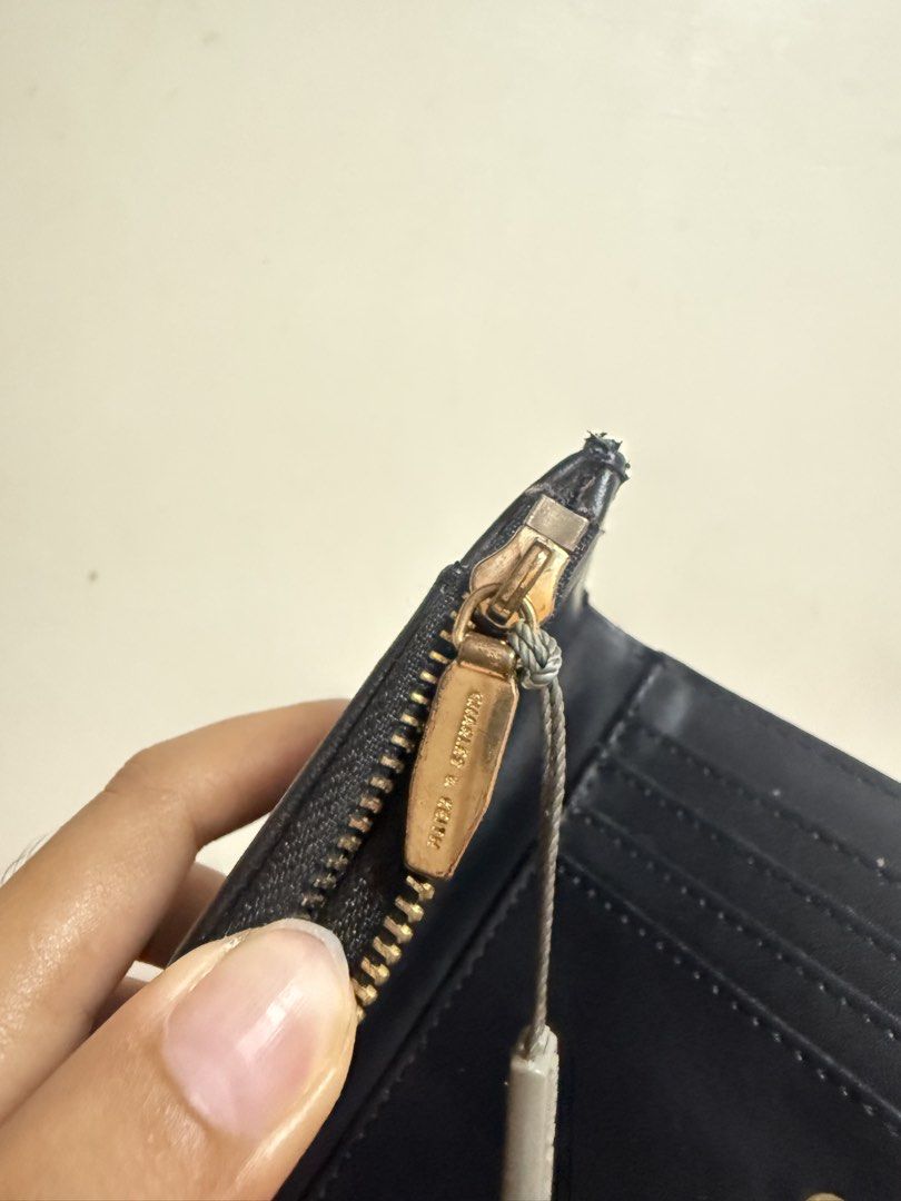 CHARLES & KEITH BLACK LEATHER WALLET (Category: Wallets & Card holders) located in Quezon City. Submitted by frannecess (Listing ID 1461985153, Image 3). Description: 🌸 FOR SALE 🌸 CHARLES & KEITH BLACK LEATHER WALLET With box only Loc: Pasong Tamo, Quezon City.