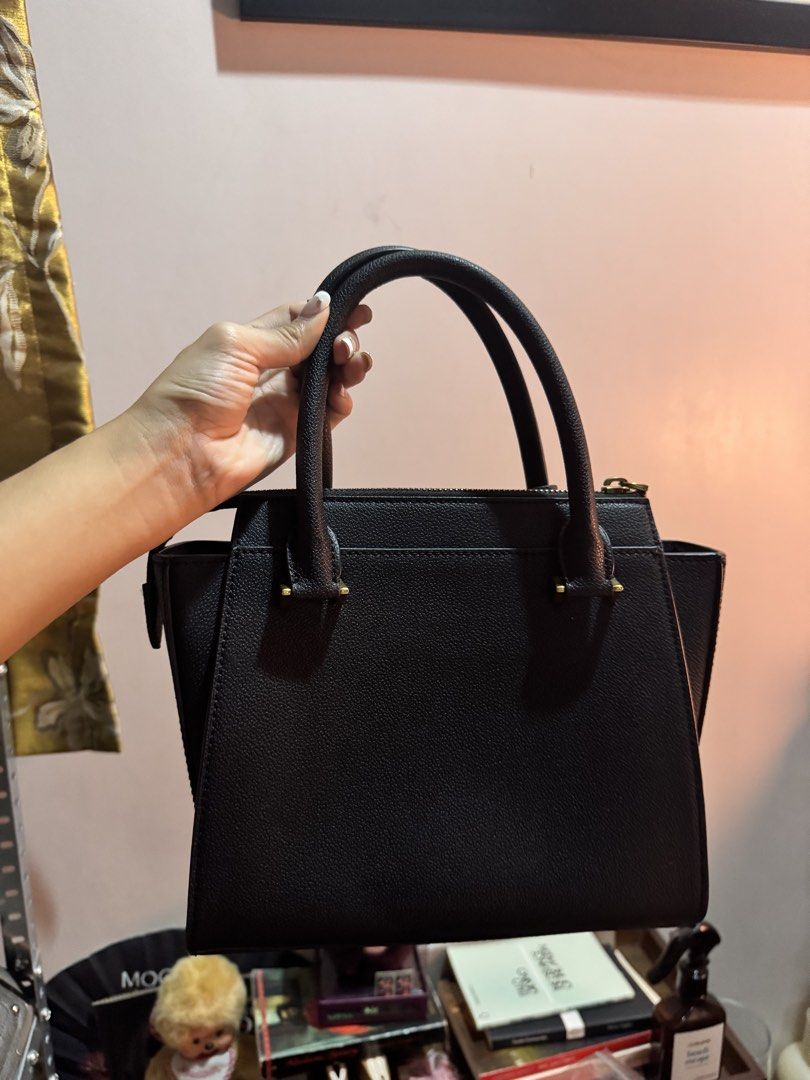 Charles & Keith Black Textured Top Handle Bag (Category: Luxury Bags & Wallets) located in Las Pinas. Submitted by theheartoverall (Listing ID 1461945529, Image 2). Description: - like new - comes with a strap and dust bag - dm for any inquiries :).