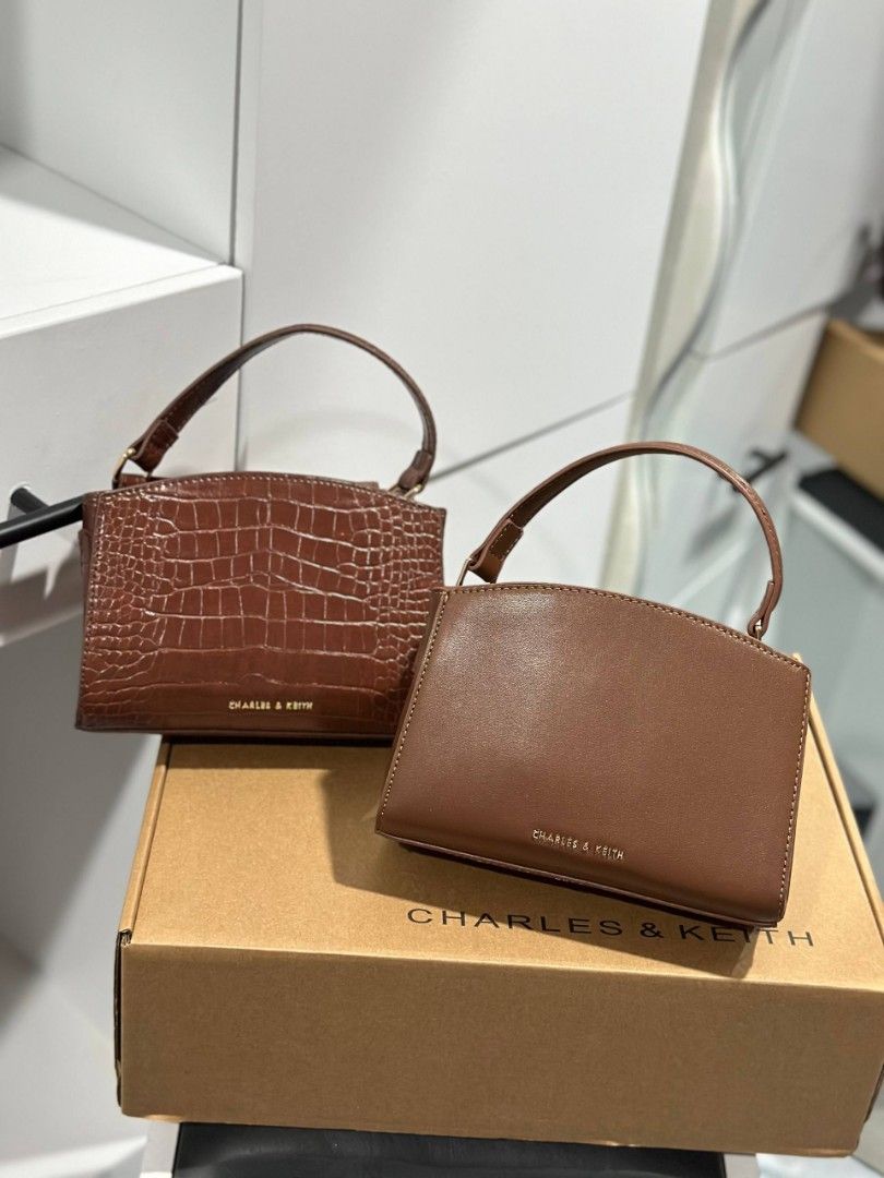 Charles&Keith Aubrielle Belted Top Handle / Sling Bag (Small) (Category: Cross-body Bags) located in Manila. Submitted by whimsy.finds (Listing ID 1461828195, Image 3). Description: FIXED PRICE Brandnew Add for box and paperbag Payment first basis via Gcash / Maribank / Maya Ship via Lalamove / JNT *No rush shipping *Open for bulk order.
