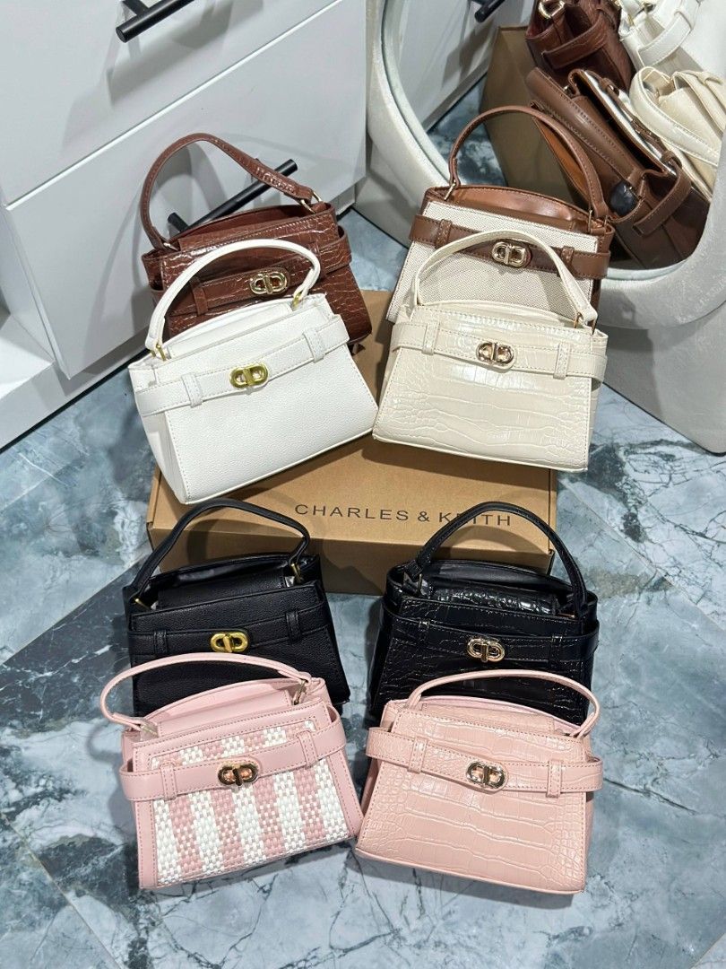 Charles&Keith Aubrielle Belted Top Handle / Sling Bag (Small) (Category: Cross-body Bags) located in Manila. Submitted by whimsy.finds (Listing ID 1461828195, Image 1). Description: FIXED PRICE Brandnew Add for box and paperbag Payment first basis via Gcash / Maribank / Maya Ship via Lalamove / JNT *No rush shipping *Open for bulk order.