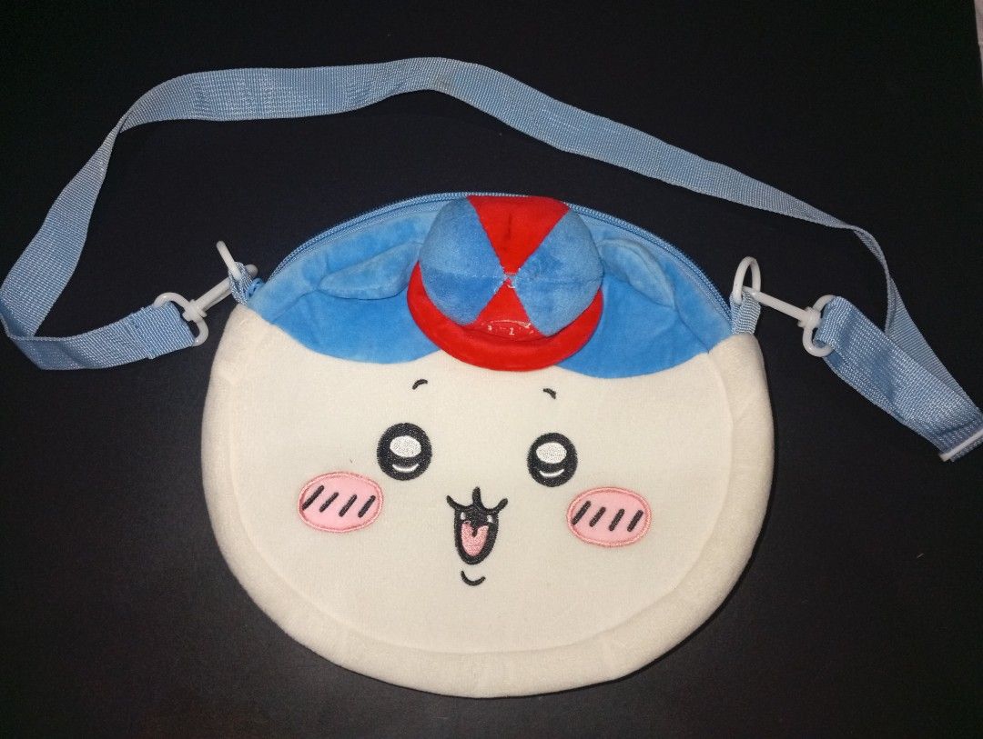 Chiikawa x Dairy Queen (DQ) (Category: Cross-body Bags) located in Tarlac. Submitted by kaizer_rabbit (Listing ID 1461909658, Image 3). Description: Chiikawa x Dairy Queen (DQ) Korean market Character Name: Hachiware (ハチワレ) from the series Chiikawa. Country of Origin: Made in China (Note: While the character, licensing, and design originate entirely from Japan, the mass physical manufacturing of these promotional plush novelty items takes place i