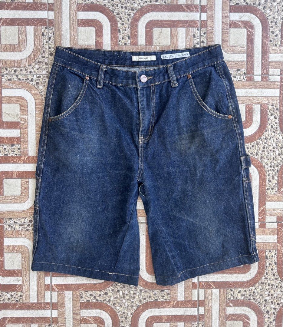 Chivalry carpenter shorts (Category: Shorts) located in Maria Aurora. Submitted by archives767 (Listing ID 1461856100, Image 2). Description: - Dickies dark wash denim shorts - Classic carpenter style with multiple pockets - Button and zip fly closure - Comfortable fit for everyday wear - Perfect for casual outfits.