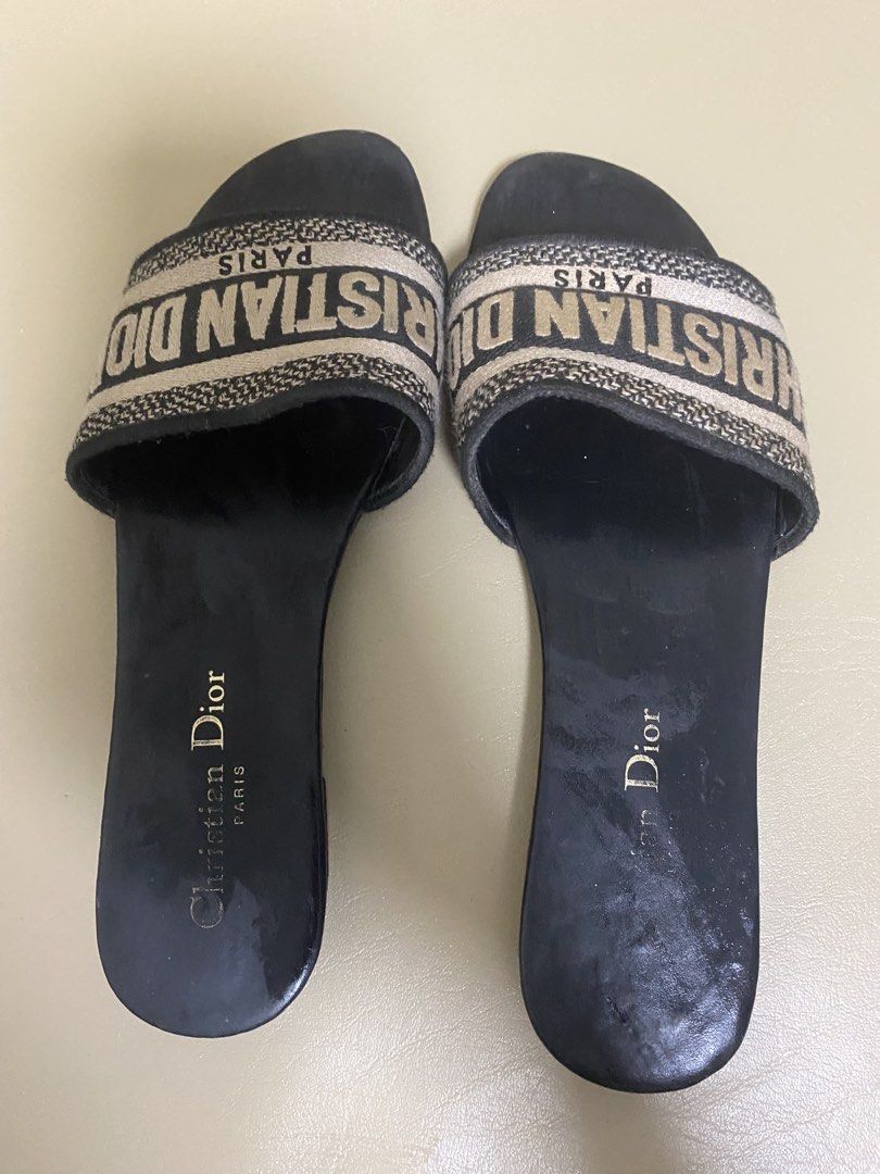 Christian Dior Paris Slides Sandals Size 37 (Category: Flats & Sandals) located in Manila. Submitted by aikara683 (Listing ID 1461970141, Image 2). Description: - Authentic Christian Dior slides - Iconic Dior logo across the strap - Made in Italy - Size: 37.