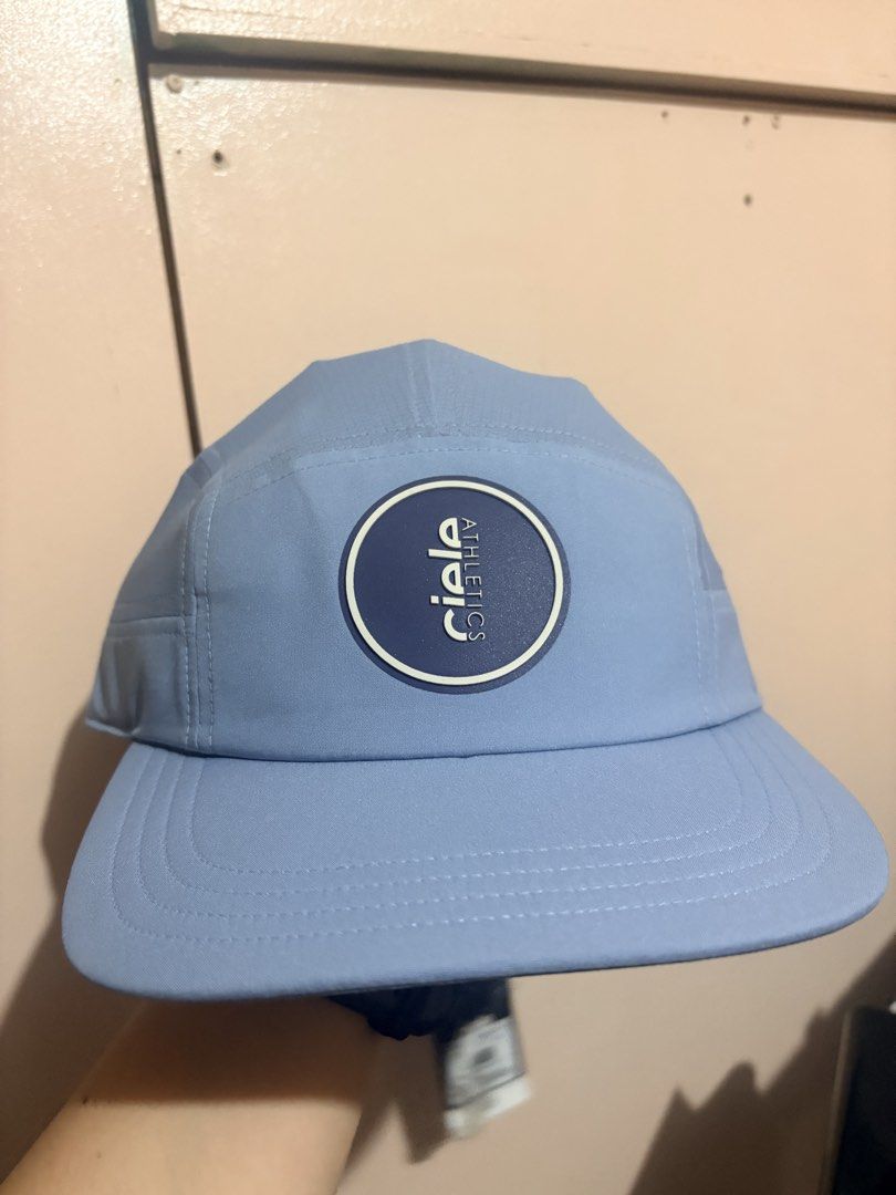 Ciele Athletics GOCAP Ninety-Chambray Cap ML (Category: Activewear) located in Manila. Submitted by yuki0624 (Listing ID 1461946900, Image 1). Description: - Ciele Athletics GOCAP Ninety-Chambray Cap - Size: ML - Color: Light Blue - Made in Vietnam - Fabric: COOLwick for enhanced breathability - Features: Adjustable strap for a customized fit - Ideal for: Running, training, or everyday casual wear.
