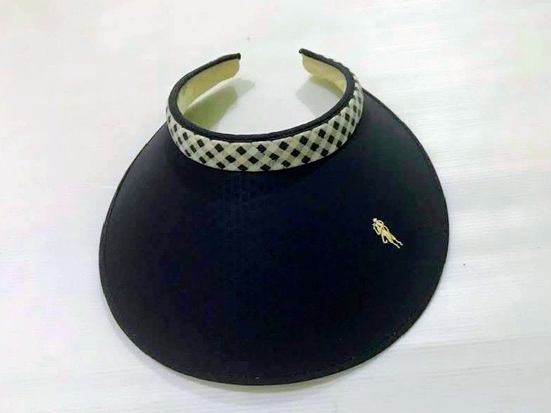 Classic Visor Hat w/ Gingham Trim & Logo (Category: Hats & Beanies) located in Pasig City. Submitted by kuhkuh (Listing ID 1461895968, Image 1). Description: Midnight blue Classic Visor UNused, just stored - Features checkered/gingham trim around the headband - Shape retention; firm, stiff - Small logo on the front - Ideal for sunny days and outdoor activities - Provides excellent sun protection - Easy and comfortable to wear.