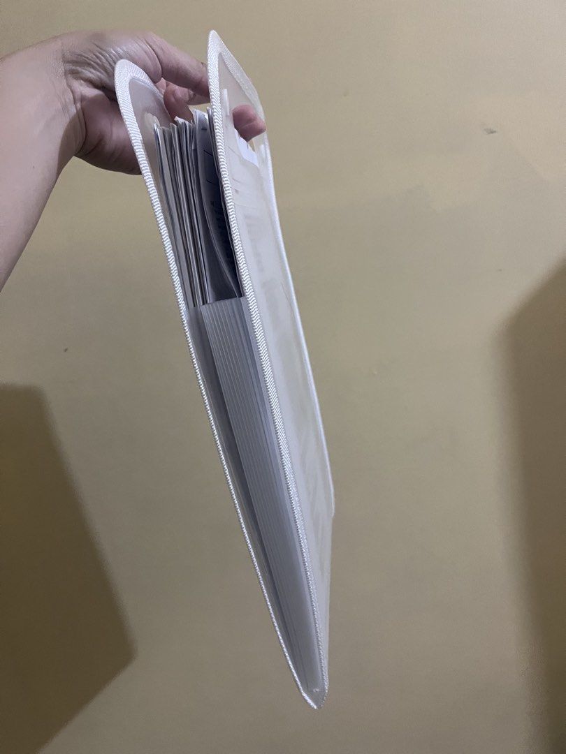 Clear Expanding File Folder with Handle (Category: Stationery & School Supplies) located in Quezon City. Submitted by ally_marie12 (Listing ID 1461904892, Image 3). Description: - Expanding file folder with built-in handle for easy carrying. - Features multiple interior pockets for superior document organization. - Ideal for keeping papers tidy and storing important files at home or in the office..